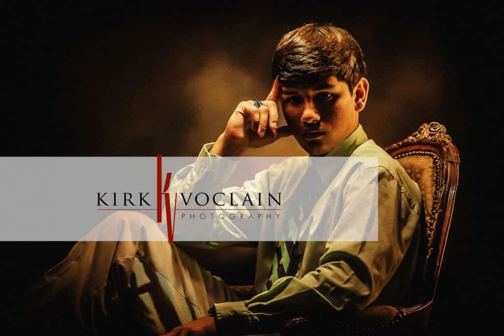Senior Boy looking like the Godfather By Kirk Voclain Photography Houma Photographer