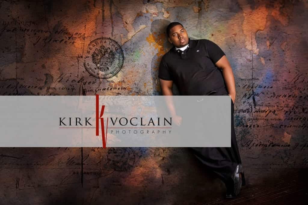 Senior Picture of boy on colorful background Kirk Voclain Houma Photographer