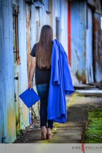 senior girl downtown houma la cap & Gown