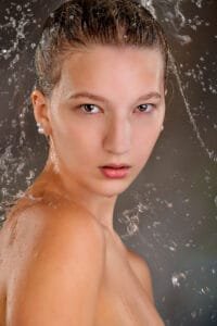 High School Senior getting splashed with Water - Kirk Voclain Photography Houma